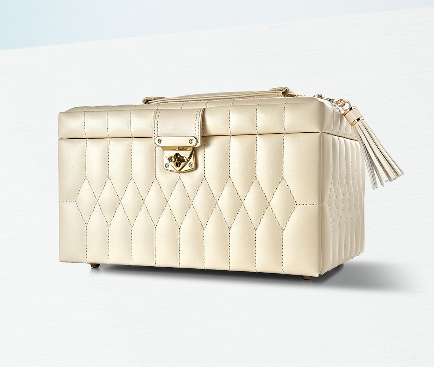 WOLF Caroline jewellery box on a light blue background.